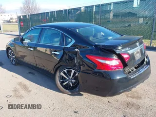 2016 Nissan Altima SR with VIN 1N4AL3AP7GC212210, listed as a IAAI auction lot 41923139 with 26,433 mi miles and . Bid and sale history available at carsss.com. Image 3.