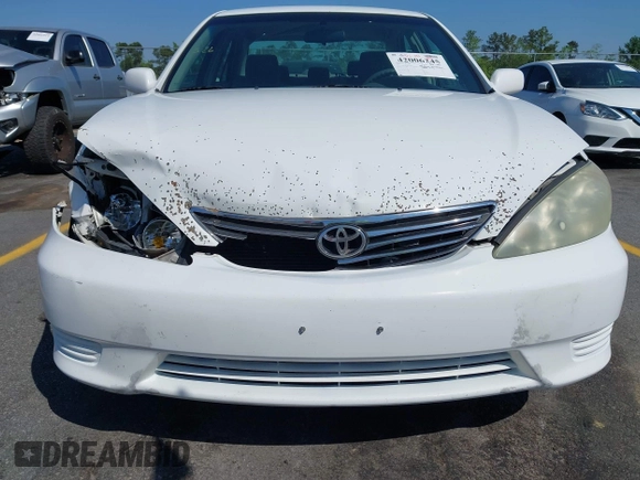 2006 Toyota Camry STD with VIN 4T1BE32KX6U734944, listed as a IAAI auction lot 42006245 with 243,967 mi miles. Bid and sale history available at carsss.com. Image 6.
