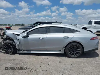 2021 Mercedes-Benz AMG GT 43 z VIN W1K7X5KB0MA039134, wystawiony jako IAAI lot #42129975 z przebiegiem 50 856 mil mil oraz . Historia ofert i sprzedaży dostępna na DreamBid. Obrazek 14.
