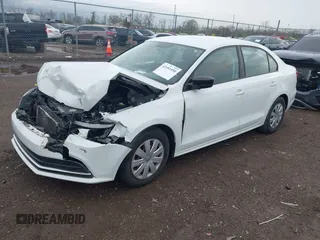 2015 Volkswagen Jetta Sedan 2.0L S with VIN 3VW2K7AJ5FM313969, listed as a IAAI auction lot 41951550 with 104,735 mi miles. Bid and sale history available at carsss.com. Image 2.
