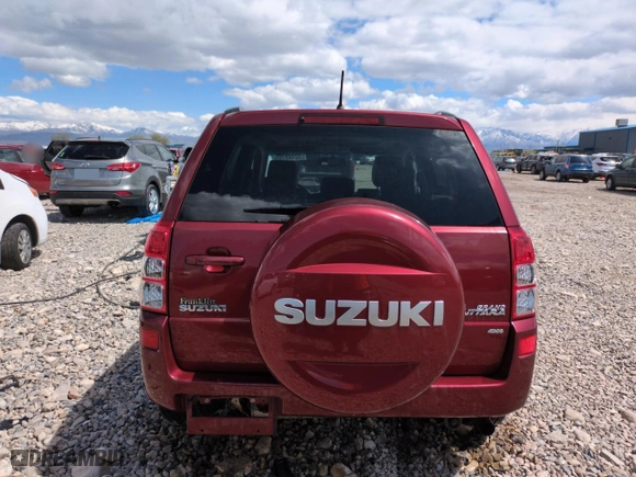 2007 Suzuki Grand Vitara Luxury with VIN JS3TE947474202306, listed as a Copart auction lot 52448755 with 98,456 mi miles and Salvage Title. Bid and sale history available at carsss.com. Image 6.