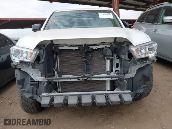 2022 Toyota Tacoma SR with VIN 3TYRX5GNXNT056019, listed as a IAAI auction lot 42026358 with 40,750 mi miles and . Bid and sale history available at DreamBid. Image 6.