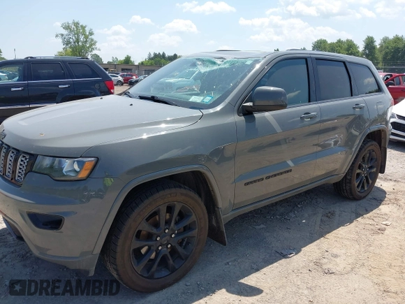 2020 Jeep Grand Cherokee Laredo E with VIN 1C4RJFAG0LC293050, listed as a IAAI auction lot 42566345 with 64,960 mi miles and . Bid and sale history available at DreamBid. Image 2.