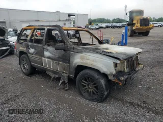 1998 Jeep Grand Cherokee Limited z VIN 1J4GZ88ZXWC255195, wystawiony jako Copart lot #55817705 z przebiegiem Nie podano mil oraz Nie do naprawy • Non repairable. Historia ofert i sprzedaży dostępna na DreamBid. Obrazek 4.