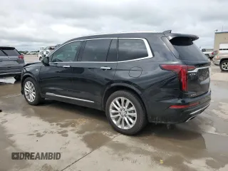 2020 Cadillac XT6 FWD Premium Luxury with VIN 1GYKPCRS9LZ148944, listed as a Copart auction lot 54406745 with 64,086 mi miles and Salvage title. Bid and sale history available at DreamBid. Image 2.