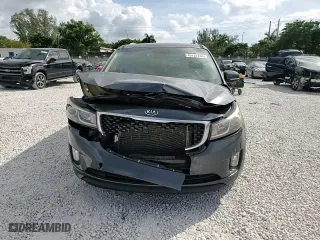 2015 Kia Sedona EX with VIN KNDMC5C11F6058294, listed as a Copart auction lot 45707255 with 125,893 mi miles and Salvage Title. Bid and sale history available at carsss.com. Image 14.