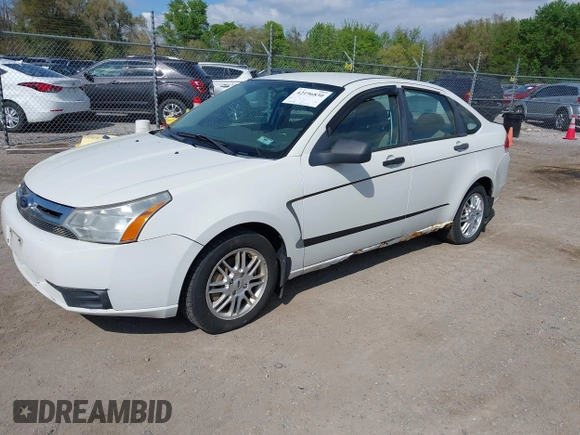 2009 Ford Focus SE with VIN 1FAHP35N19W113864, listed as a IAAI auction lot 42196830 with 192,998 mi miles. Bid and sale history available at carsss.com. Image 2.