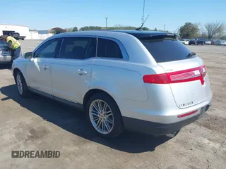 2015 Lincoln MKT EcoBoost with VIN 2LMHJ5AT4FBL00959, listed as a IAAI auction lot 41991763 with 159,687 mi miles and . Bid and sale history available at DreamBid. Image 3.