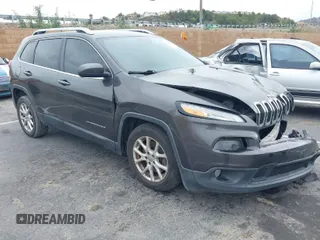 2014 Jeep Cherokee Latitude with VIN 1C4PJLCS2EW217130, listed as a IAAI auction lot 41782039 with 129,080 mi miles. Bid and sale history available at carsss.com. Image 1.