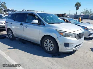 2016 Kia Sedona LX with VIN KNDMB5C19G6100800, listed as a IAAI auction lot 41882151 with 127,257 mi miles. Bid and sale history available at carsss.com. Image 1.