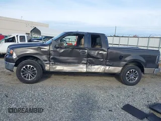 2005 Ford F-150 XLT with VIN 1FTPX12505NB28550, listed as a IAAI auction lot 41381125 with 248,711 mi miles. Bid and sale history available at carsss.com. Image 14.