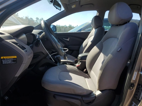 2010 Hyundai Tucson GLS with VIN KM8JT3AC1AU013660, listed as a Copart auction lot 43033645 with 159,537 mi miles and Salvage Title. Bid and sale history available at carsss.com. Image 7.