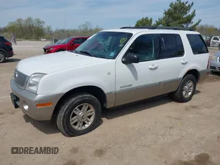 2002 Mercury Mountaineer Convenience z VIN 4M2ZU86W32ZJ21765, wystawiony jako IAAI lot #42209425 z przebiegiem 135 090 mil mil oraz . Historia ofert i sprzedaży dostępna na DreamBid. Obrazek 2.