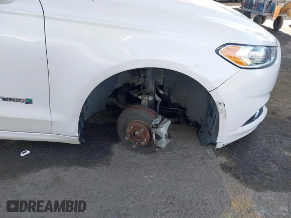 2013 Ford Fusion SE Hybrid z VIN 3FA6P0LU1DR310075, wystawiony jako IAAI lot #42085556 z przebiegiem Nie podano mil oraz . Historia ofert i sprzedaży dostępna na DreamBid. Obrazek 6.