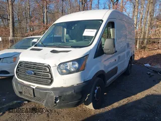 2019 Ford Transit with VIN 1FTYE1CM6KKA74930, listed as a IAAI auction lot 41020843 with 104,218 mi miles and . Bid and sale history available at DreamBid. Image 17.