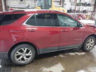 2019 Chevrolet Equinox Premier with VIN 2GNAXXEV0K6110156, listed as a IAAI auction lot 41639256 with 99,531 mi miles and . Bid and sale history available at carsss.com. Image 13.