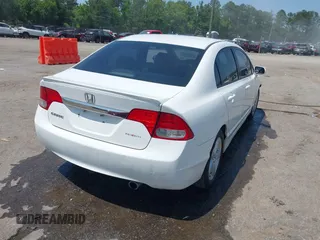 2010 Honda Civic LX-S z VIN 2HGFA1F65AH520380, wystawiony jako IAAI lot #42388957 z przebiegiem 200 786 mil mil oraz . Historia ofert i sprzedaży dostępna na DreamBid. Obrazek 4.