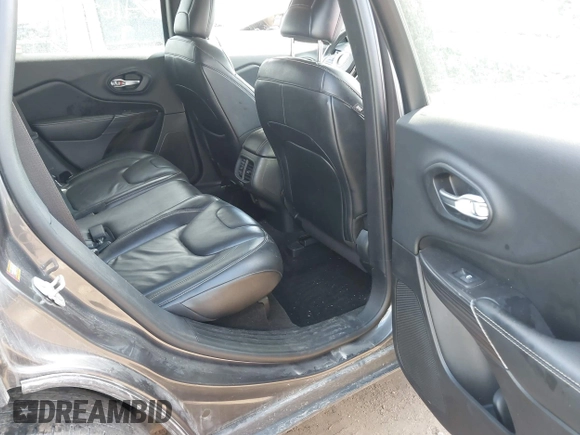 2015 Jeep Cherokee Limited with VIN 1C4PJMDB7FW591772, listed as a IAAI auction lot 41684106 with 118,708 mi miles and . Bid and sale history available at DreamBid. Image 8.