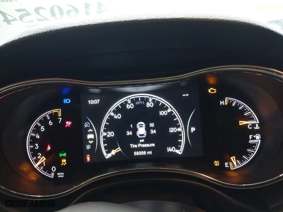 2019 Jeep Grand Cherokee Laredo E with VIN 1C4RJFAG1KC818289, listed as a IAAI auction lot 41602541 with 59,356 mi miles. Bid and sale history available at carsss.com. Image 7.