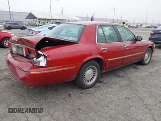 2000 Mercury Grand Marquis LS z VIN 2MEFM75W0YX658319, wystawiony jako IAAI lot #42028736 z przebiegiem 154 651 mil mil oraz . Historia ofert i sprzedaży dostępna na DreamBid. Obrazek 4.
