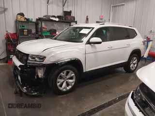 2018 Volkswagen Atlas SE with VIN 1V2KR2CA7JC574270, listed as a IAAI auction lot 41654110 with 104,440 mi miles and . Bid and sale history available at DreamBid. Image 22.