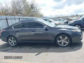 2012 Acura TL Tech Auto with VIN 19UUA9F54CA801889, listed as a IAAI auction lot 41939315 with 186,961 mi miles. Bid and sale history available at carsss.com. Image 13.
