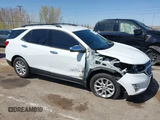 2019 Chevrolet Equinox LS z VIN 3GNAXHEV4KS593156, wystawiony jako IAAI lot #41979511 z przebiegiem 53 124 mil mil oraz . Historia ofert i sprzedaży dostępna na DreamBid. Obrazek 14.