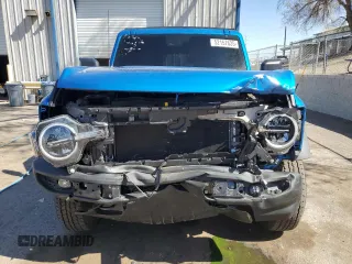 2024 Ford Bronco Big Bend z VIN 1FMDE7BH9RLB50114, wystawiony jako Copart lot #52157635 z przebiegiem 1 002 mil mil oraz Szkoda całkowita • Salvage title. Historia ofert i sprzedaży dostępna na DreamBid. Obrazek 5.