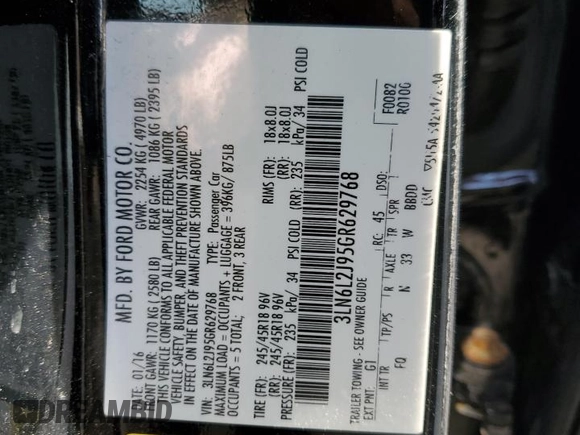 2016 Lincoln MKZ z VIN 3LN6L2J95GR629768, wystawiony jako Copart lot #49098085 z przebiegiem 116 365 mil mil oraz Szkoda całkowita • Salvage title. Historia ofert i sprzedaży dostępna na DreamBid. Obrazek 12.