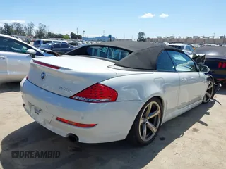 2009 BMW 6 Series 650i z VIN WBAEB53579CX64649, wystawiony jako IAAI lot #41937705 z przebiegiem 136 164 mil mil oraz . Historia ofert i sprzedaży dostępna na DreamBid. Obrazek 4.