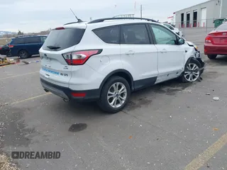 2018 Ford Escape SE z VIN 1FMCU9GD0JUC62783, wystawiony jako IAAI lot #41488153 z przebiegiem 55 774 mil mil oraz . Historia ofert i sprzedaży dostępna na DreamBid. Obrazek 4.