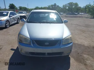 2005 Kia Spectra LX with VIN KNAFE121955107403, listed as a IAAI auction lot 42055036 with 157,605 mi miles. Bid and sale history available at carsss.com. Image 12.