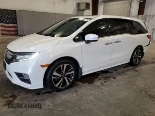 2018 Honda Odyssey Elite with VIN 5FNRL6H9XJB001308, listed as a Copart auction lot 57651785 with 64,023 mi miles and Salvage title. Bid and sale history available at DreamBid. Image 1.