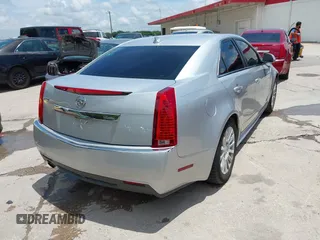 2013 Cadillac CTS Luxury with VIN 1G6DE5E56D0179190, listed as a IAAI auction lot 42726459 with 145,393 mi miles and . Bid and sale history available at DreamBid. Image 4.