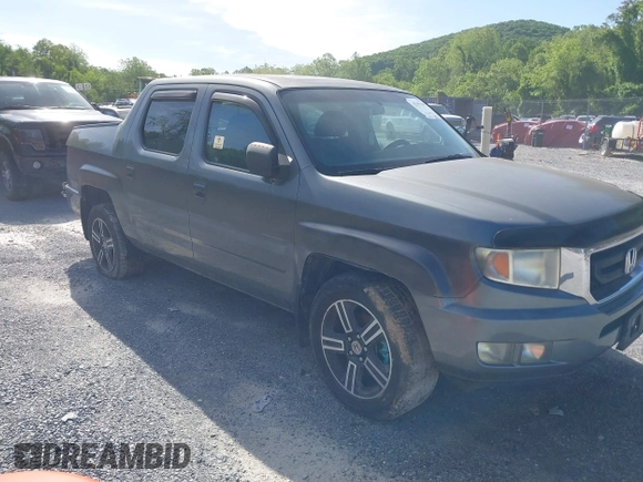 2009 Honda Ridgeline RTL with VIN 2HJYK16539H503533, listed as a IAAI auction lot 42307300 with 206,102 mi miles and . Bid and sale history available at DreamBid. Image 1.