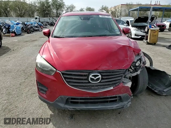 2016 Mazda CX-5 Grand Touring with VIN JM3KE4DY0G0820954, listed as a Copart auction lot 48027785 with 152,448 mi miles and Salvage Title. Bid and sale history available at carsss.com. Image 11.