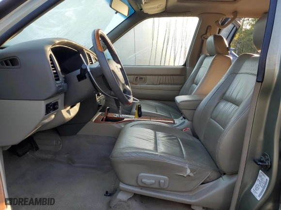 2002 Infiniti QX4 Luxury with VIN JNRDR09Y12W253991, listed as a Copart auction lot 71294314 with 139814 miles and Clean Title. Bid and sale history available at carsss.com. Image 7.
