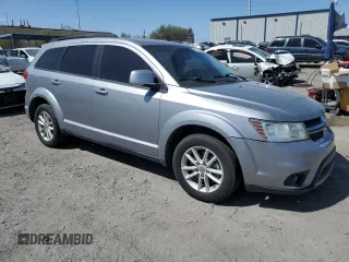 2017 Dodge Journey SXT with VIN 3C4PDCBG6HT571862, listed as a Copart auction lot 53386185 with 150,748 mi miles and Salvage title. Bid and sale history available at DreamBid. Image 4.
