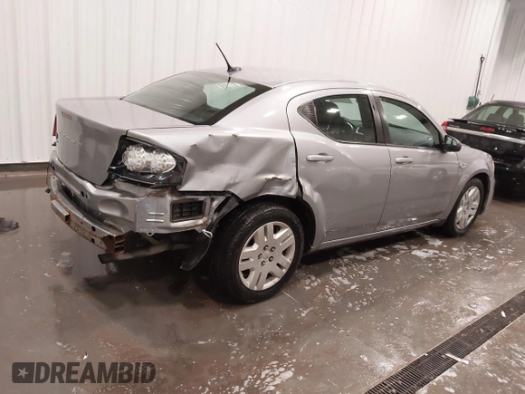 2014 Dodge Avenger SE with VIN 1C3CDZAB4EN148429, listed as a IAAI auction lot 41687320 with 149,084 mi miles and . Bid and sale history available at DreamBid. Image 4.
