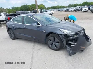 2018 Tesla Model 3 Long Range Battery with VIN 5YJ3E1EB3JF119498, listed as a IAAI auction lot 41966643 with 45,566 mi miles and . Bid and sale history available at DreamBid. Image 1.