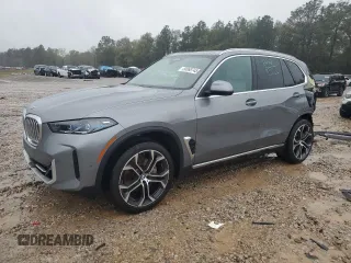 2024 BMW X5 sDrive40i z VIN 5UX13EU09R9S65574, wystawiony jako Copart lot #50068745 z przebiegiem 27 083 mil mil oraz Szkoda całkowita • Salvage title. Historia ofert i sprzedaży dostępna na DreamBid. Obrazek 1.