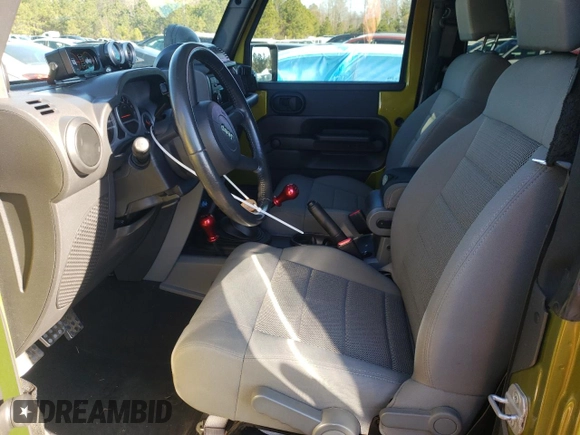 2008 Jeep Wrangler Rubicon с VIN 1J4GA64198L518646, выставлен на аукционе Copart как лот 82381084 с пробегом Не указан миль и Списание • Salvage title. История ставок и продаж доступна на DreamBid. Изображение 7.