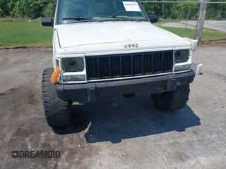 1996 Jeep Cherokee Country with VIN 1J4FJ78SXTL189940, listed as a IAAI auction lot 42020459 with 181,035 mi miles. Bid and sale history available at carsss.com. Image 6.