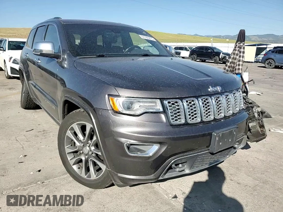 2017 Jeep Grand Cherokee Overland with VIN 1C4RJFCG9HC601806, listed as a Copart auction lot 61786275 with 122,898 mi miles and Salvage title. Bid and sale history available at DreamBid. Image 15.