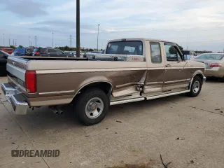 1992 Ford F-150 with VIN 1FTEX15H2NKA46074, listed as a Copart auction lot 79233364 with 188,545 mi miles and Salvage Title. Bid and sale history available at carsss.com. Image 3.