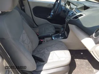 2013 Ford Fiesta SE with VIN 3FADP4EJ3DM136332, listed as a IAAI auction lot 42142556 with 69,979 mi miles and . Bid and sale history available at DreamBid. Image 5.