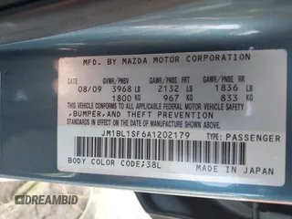 2010 Mazda 3 i SV with VIN JM1BL1SF6A1202179, listed as a IAAI auction lot 41734203 with 165,317 mi miles and . Bid and sale history available at DreamBid. Image 9.