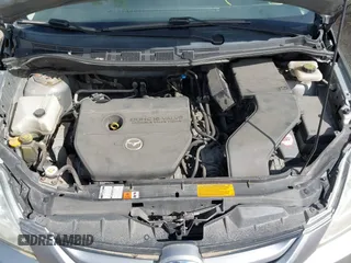 2010 Mazda 5 Sport with VIN JM1CR2W31A0384307, listed as a IAAI auction lot 42305589 with 144,372 mi miles and . Bid and sale history available at DreamBid. Image 10.