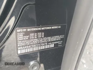 2012 BMW 7 Series 740Li with VIN WBAKB4C59CC576476, listed as a Copart auction lot 55670215 with 100,907 mi miles and Salvage title. Bid and sale history available at DreamBid. Image 12.