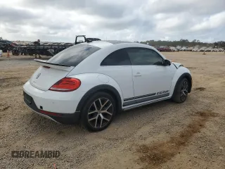 2016 Volkswagen Beetle with VIN 3VWS07AT5GM621801, listed as a Copart auction lot 77085764 with Not Provided miles and Salvage Title. Bid and sale history available at DreamBid. Image 3.